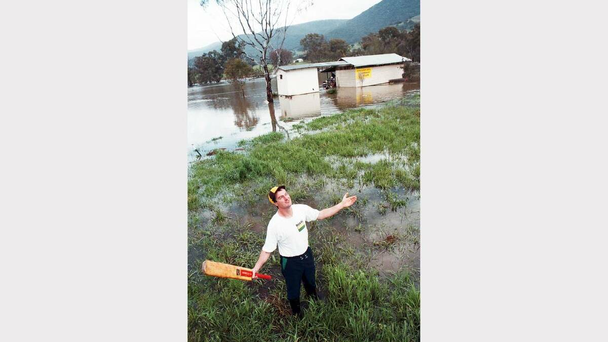 Alan Streeter at the Sandy Creek cricket ground, which is under water. Picture: SIMON DALLINGER