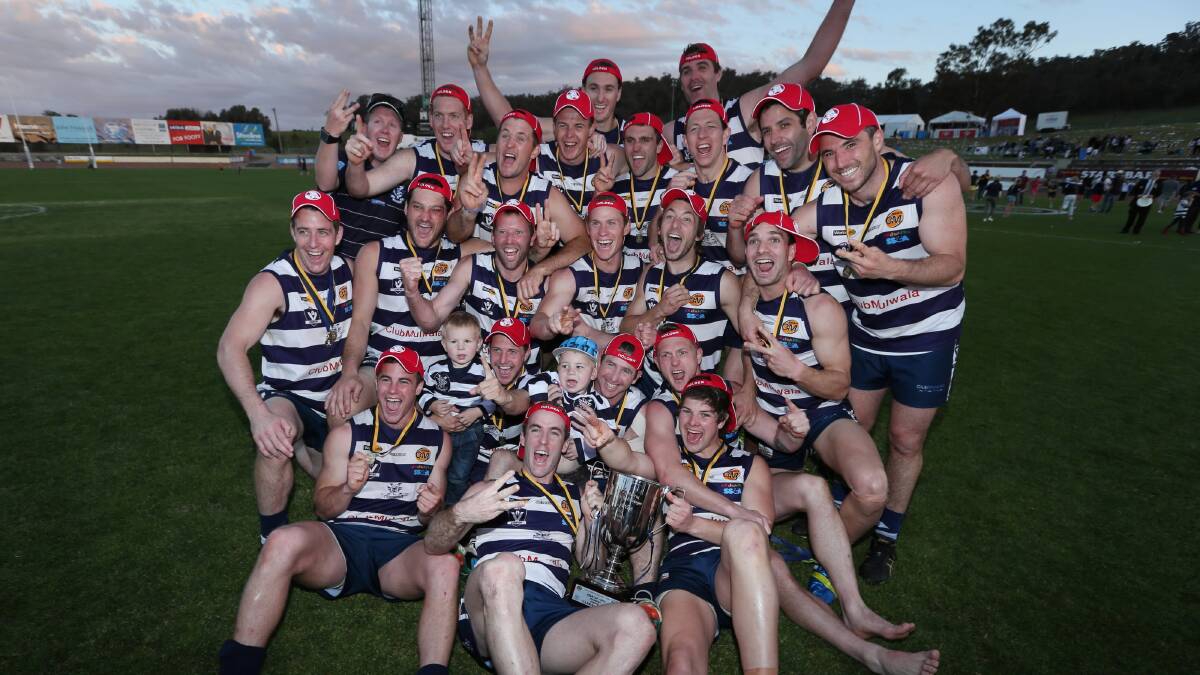 The Pigeons celebrating after their grand final win. 