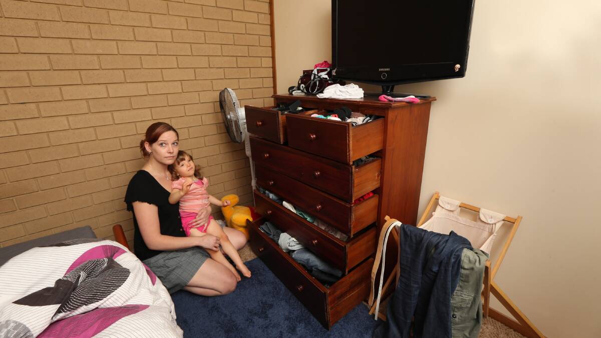 Corowa mum Melanie Stephens, with her daughter Ella Stephens, 2, warned residents to lock-up and secure their homes after her home was broken into and ransacked just days before Christmas.