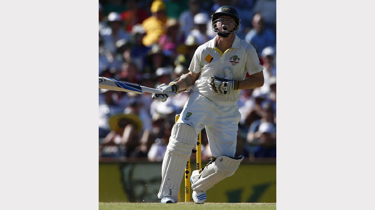 Australia's Chris Rogers reacts as he is hit by a ball by England's Ben Stokes . Picture: REUTERS