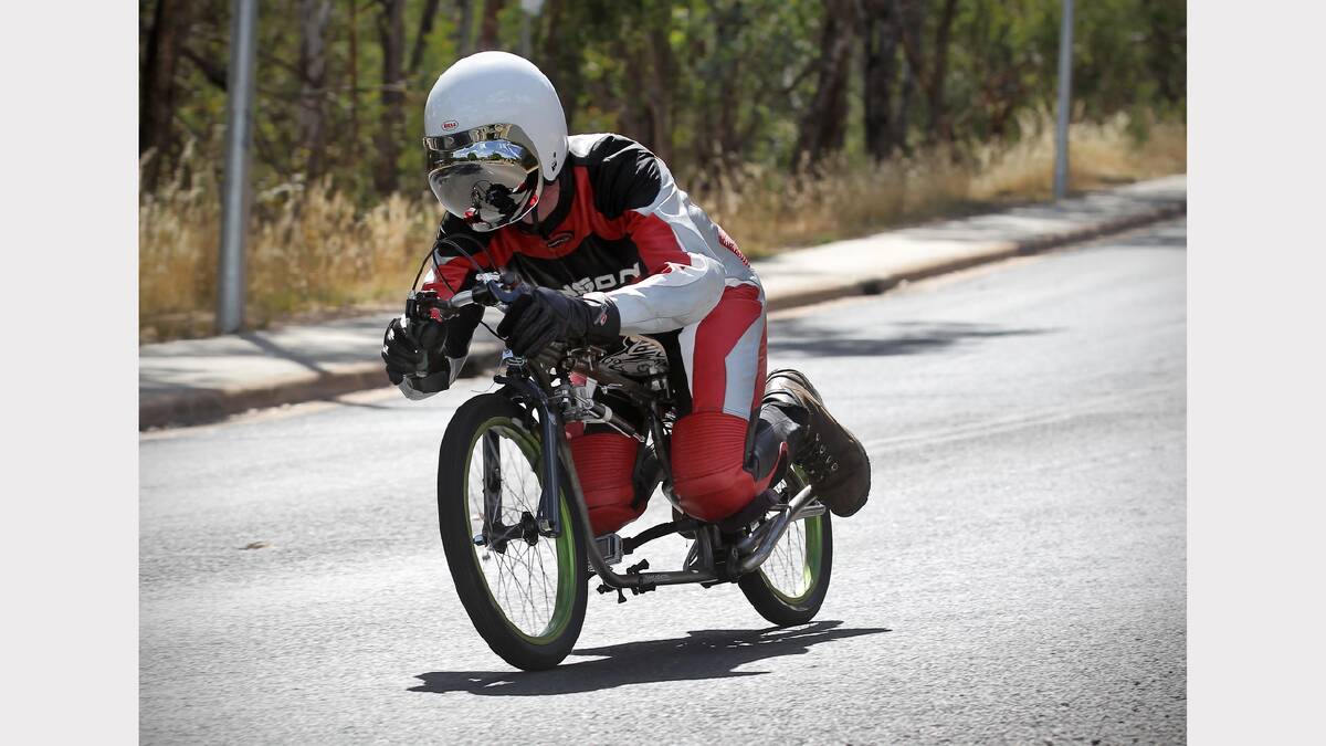 Mark Riddell demonstrates his skills on his home-made gravity bike.