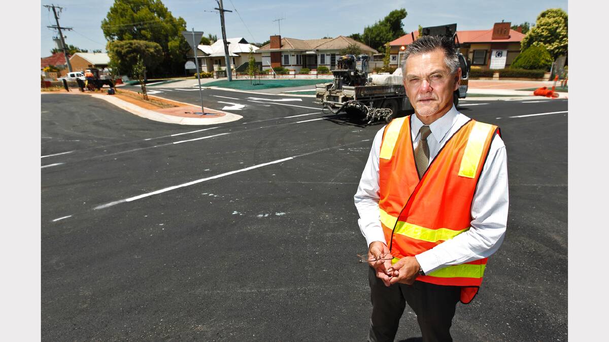 Wodonga Council director planning and infrastructure Leon Schultz inspects the finished works.