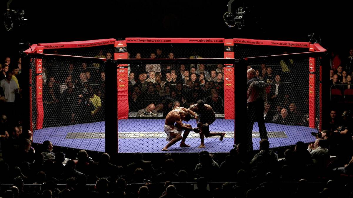 Fighters compete during the World Cage Fighting Championships. Picture: GETTY IMAGES