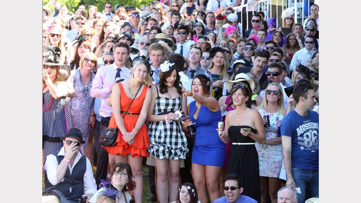 ALBURY: Albury punters Charlotte Deery, 18, Melissa Bihler, 19, Bethany Tobin, 19, and Bianca White, 23, watch and celebrate as they score a win in the Melbourne Cup yesterday. 