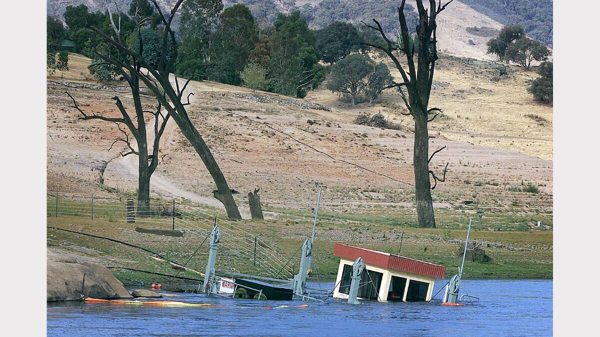 The Wymah Ferry sunk on the NSW side of the lake, which was reduced to a river, in February 2003. 