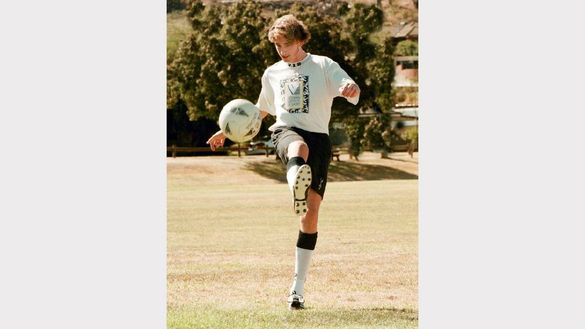Josh Kennedy wins a soccer scholarship to the Australian Institute of Sport in 1998.