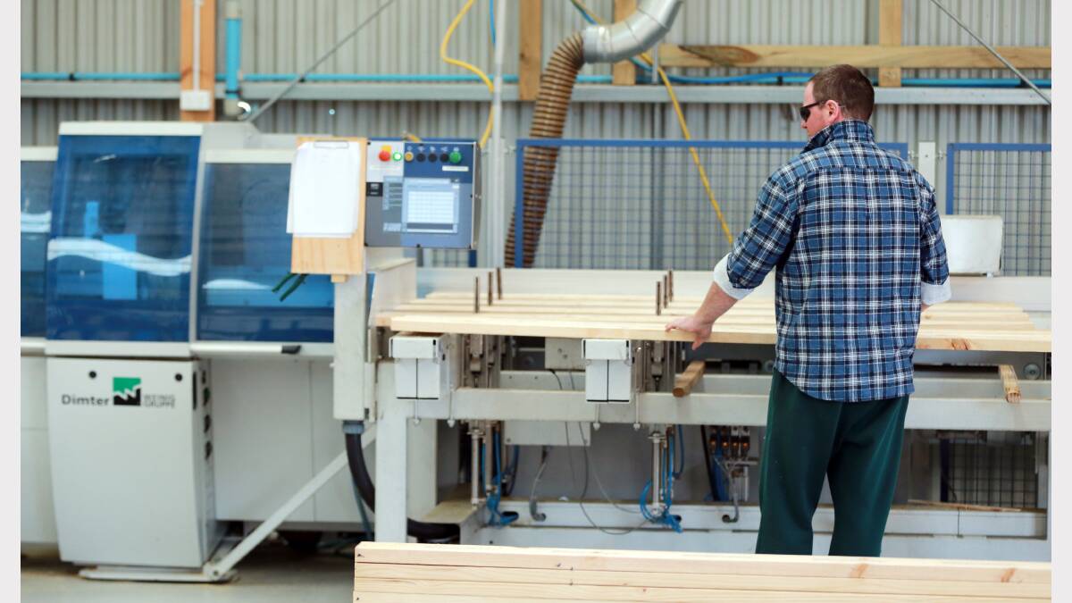  Inside the factory where cubby houses and dog kennels are made into flat packs.