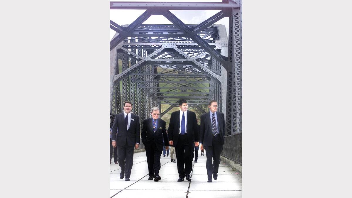 2001 - Wodonga mayor John Watson, Albury mayor Mel read, Victorian Premier Steve Bracks and NSW Premier Bob Carr pictured on the Bethanga Bridge.