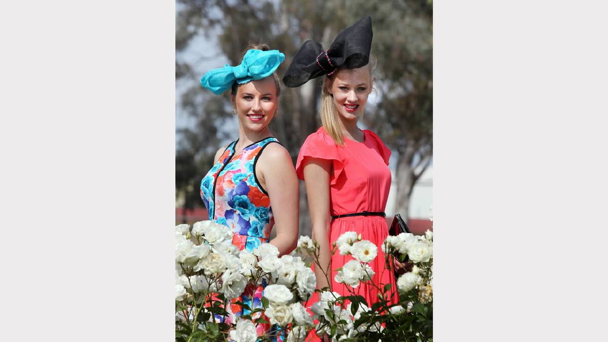 Kiewa's Melanie Andrew, 20 and Ellen Cook, 18, modelling clothes from Myer and head pieces by The Fabric Florist.