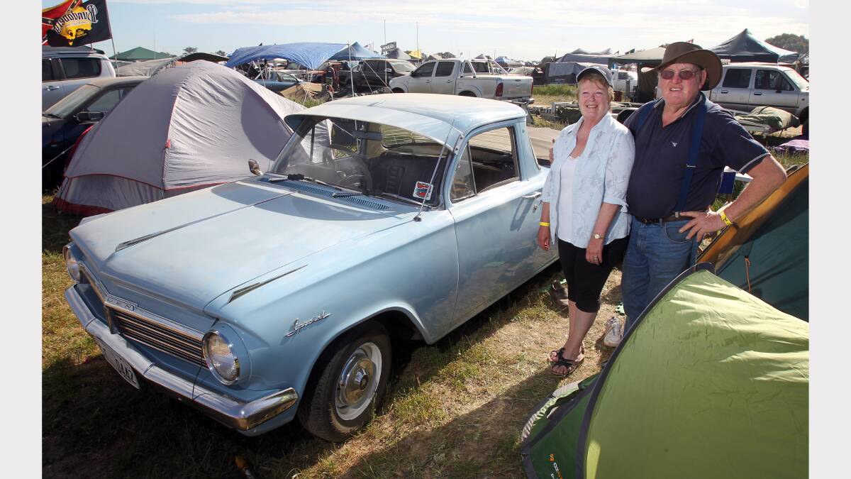 Ron and Tricia Flowers with their  with their EH Holden Ute. 