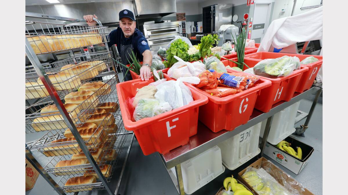  Inside the kitchen where produce is laid out ready for collection by those inmates who self cater in their units. 