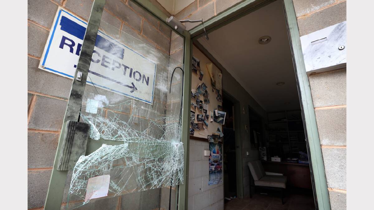 A door was smashed during the robbery. 
