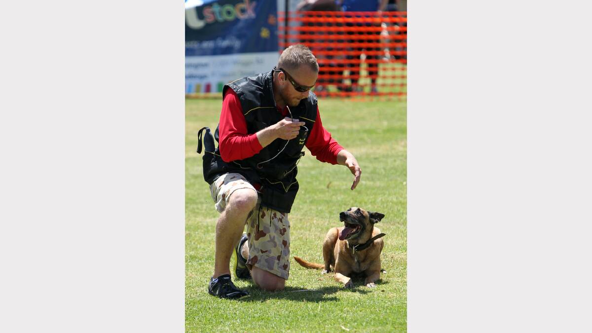 International Dog trainer Brad Griggs gives training tips with his dog, Lexus. 