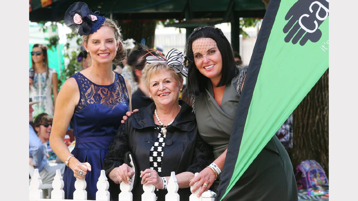 Carla McFaull, Di Mant and Jodie Tiernan enjoy the hospitality at the Care Van Marquee in Albury yesterday. The day raised about $3000 for the charity.