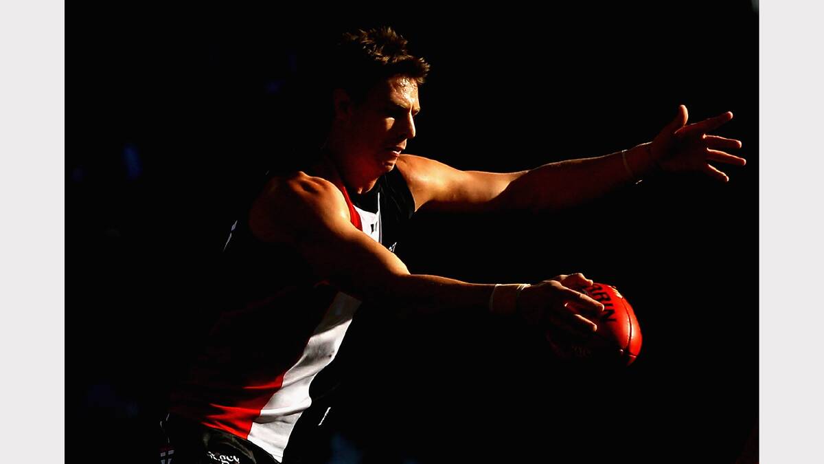 Justin Koschitzke of the Saints kicks during the round nine AFL match between the St Kilda Saints and the Melbourne Demons (2011). Picture: GETTY IMAGES