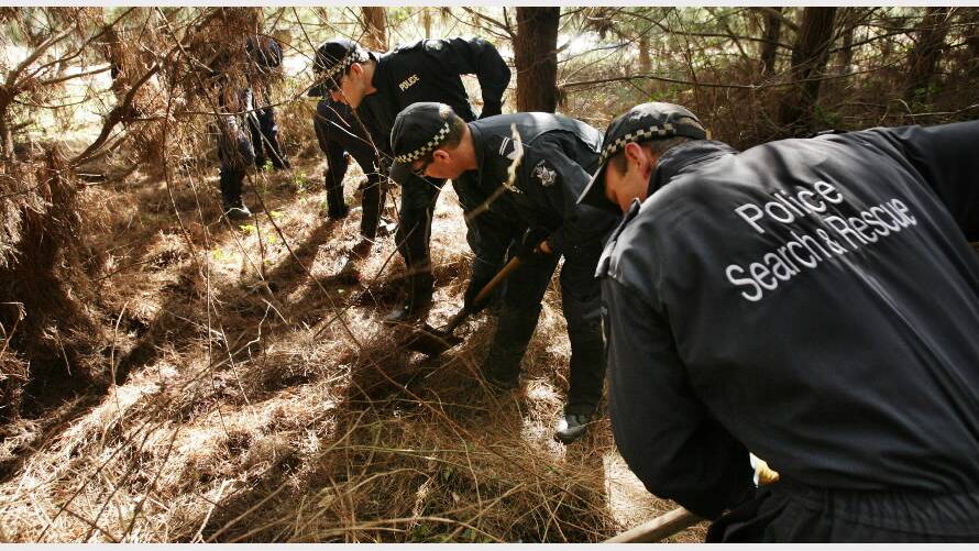 2007 -  Police officers searching bush and forestry areas at Slaughter Yard Road, 15kms south west of Myrtleford, for the remains of the missing toddler .