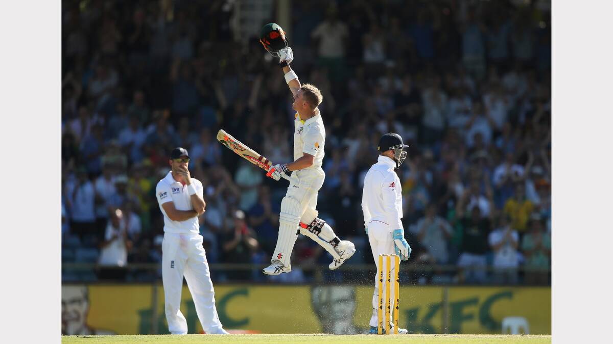 David Warner of Australia leaps after he scored his century. Picture: GETTY IMAGES