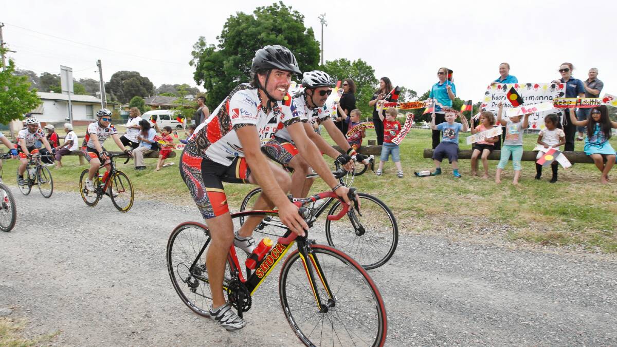 Shane Venables rides into Albury to celebrate the end of the Tour Da Country event. Picture: EYLES