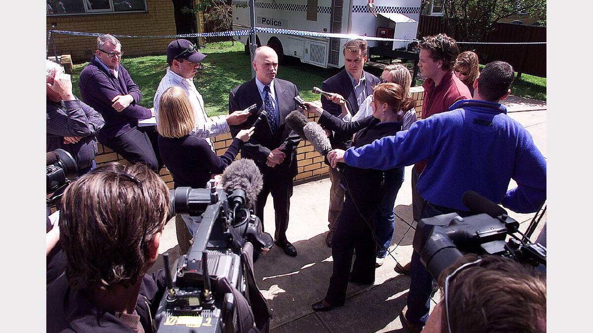 2003 - Senior Sergeant Rowland Legg talks to the media outside the Myrtleford police station.