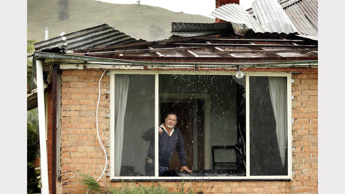 Man's home damaged on Beechworth Road, at Leneva. Dec, 2005
