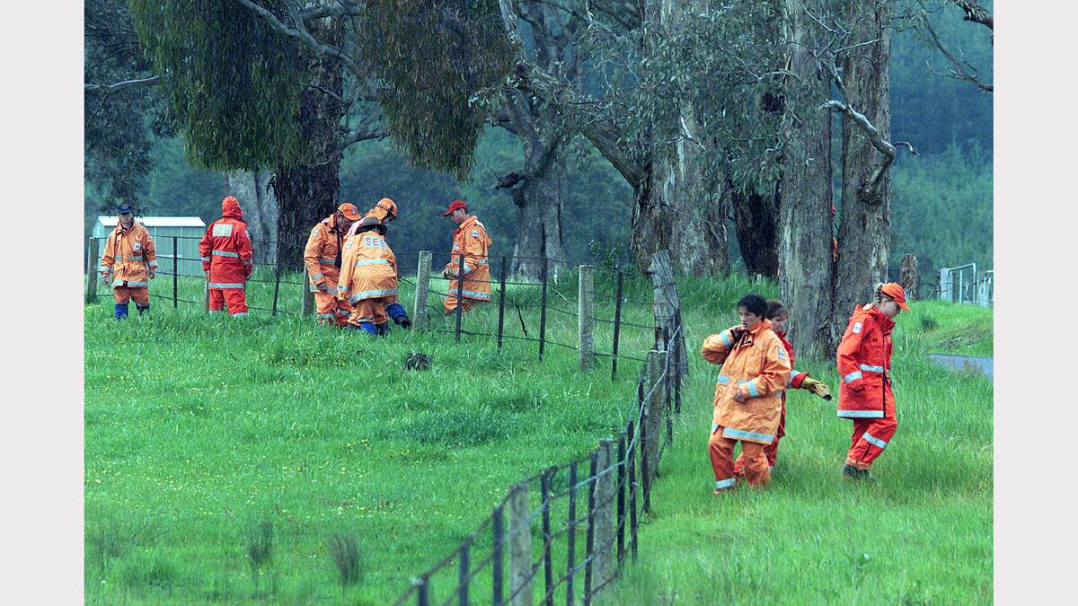 2003 - SES workers search for Daniel Thomas. 
