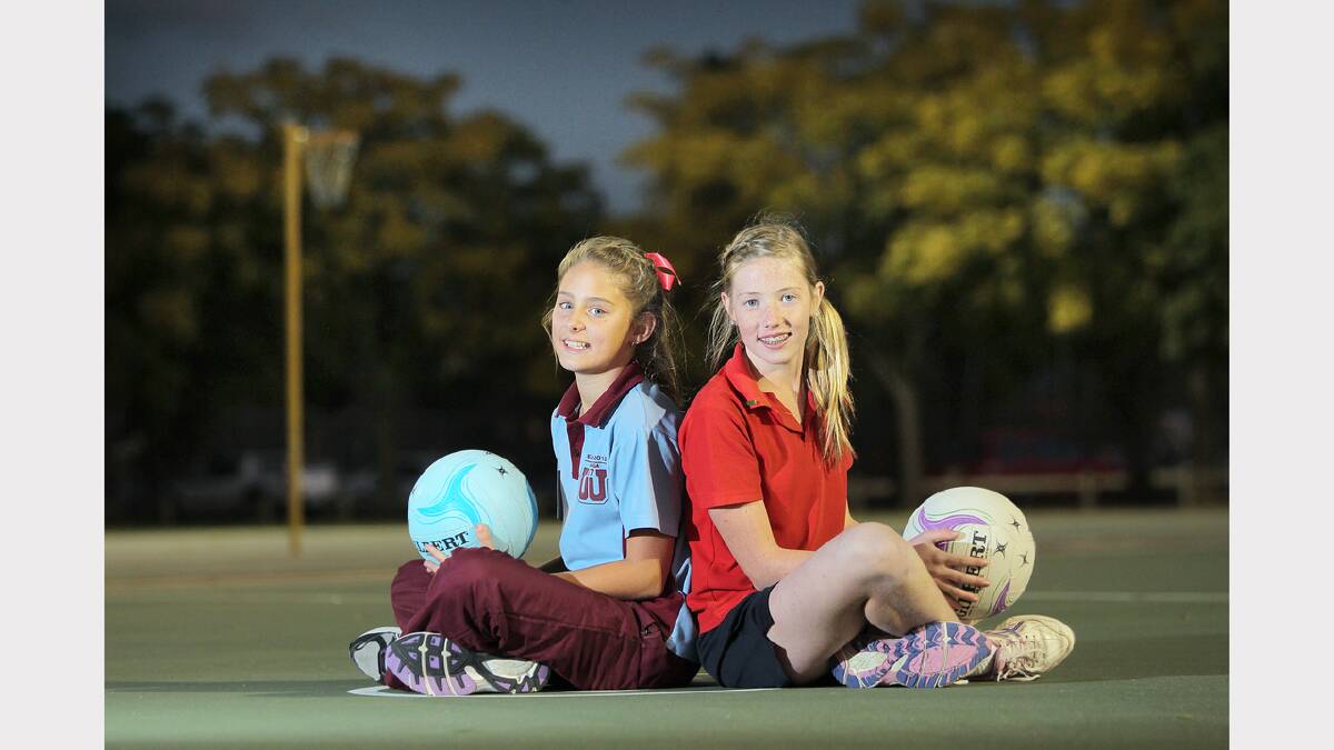 Wodonga youngsters Hollie Chesser and Zoe Lawson, both 12, have been selected for the Victorian State School Netball Trials. Picture: TARA GOONAN