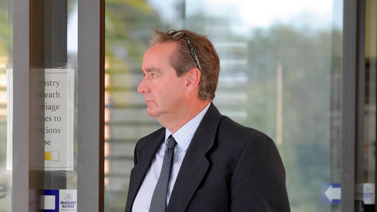 Albury Wodonga Health deputy director of medical services Glenn Davies leaves court.