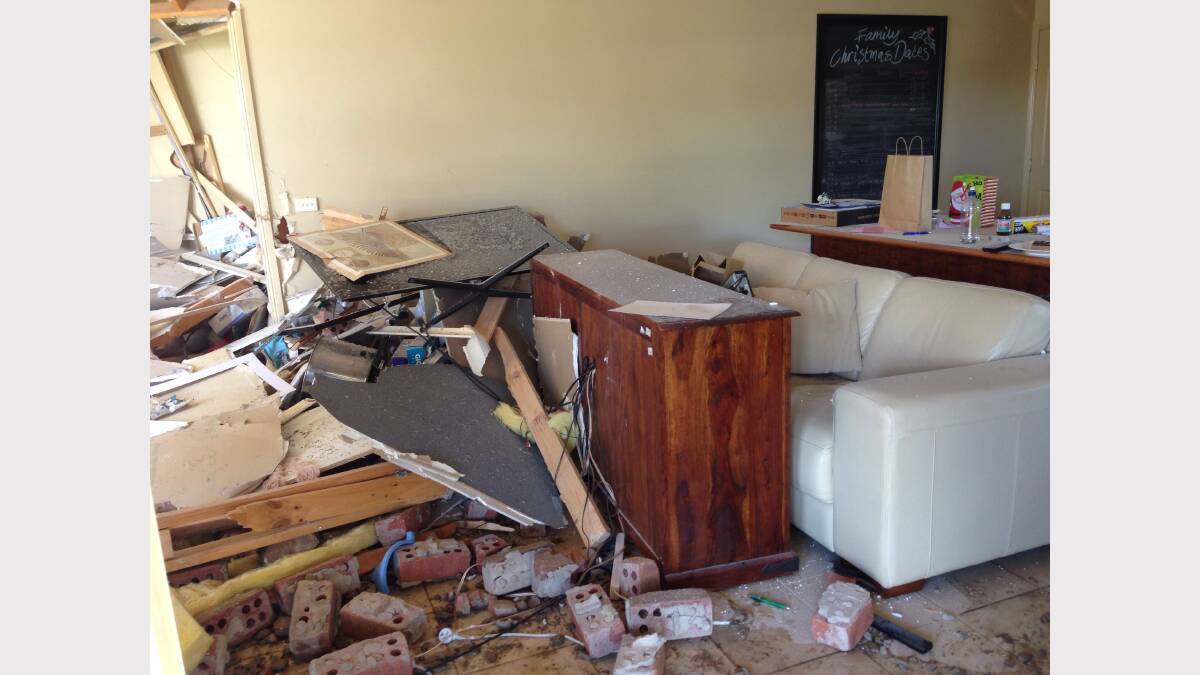 A bathroom, wine cellar and part of a lounge room was completely destroyed after the LandCruiser ploughed into this house. 