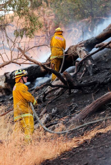 Firefighters tackled a grass fire at Huon Hill. 
