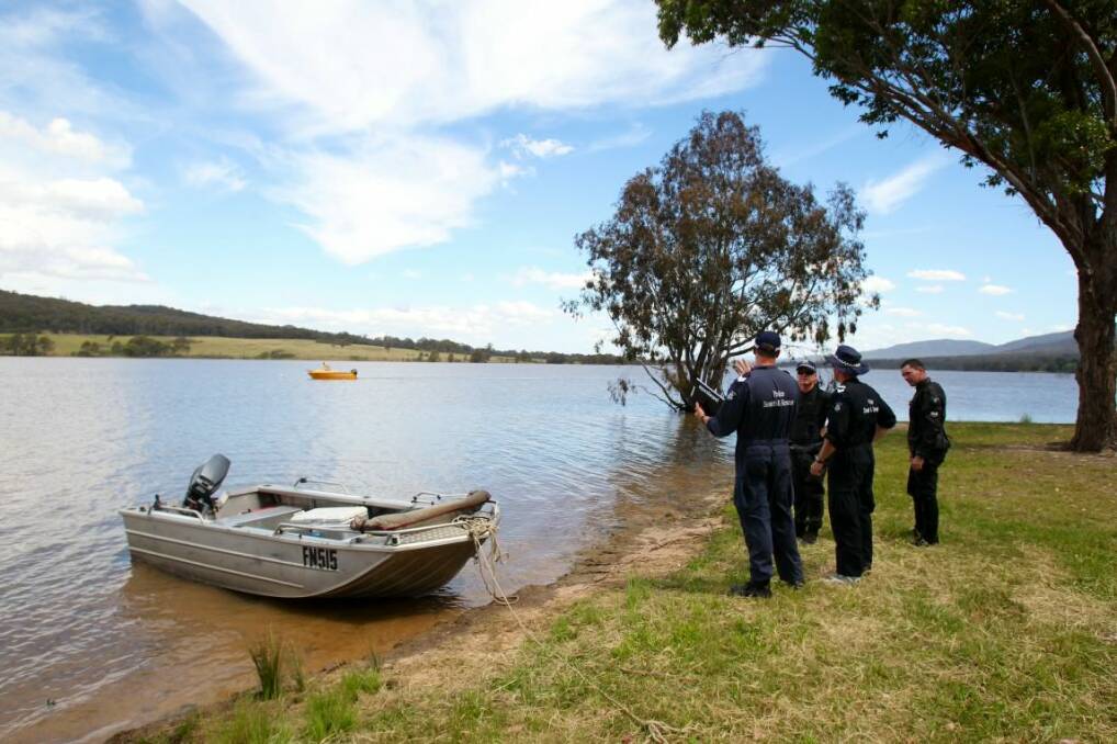 Police at the scene where the man went missing. Picture: MARK JESSER