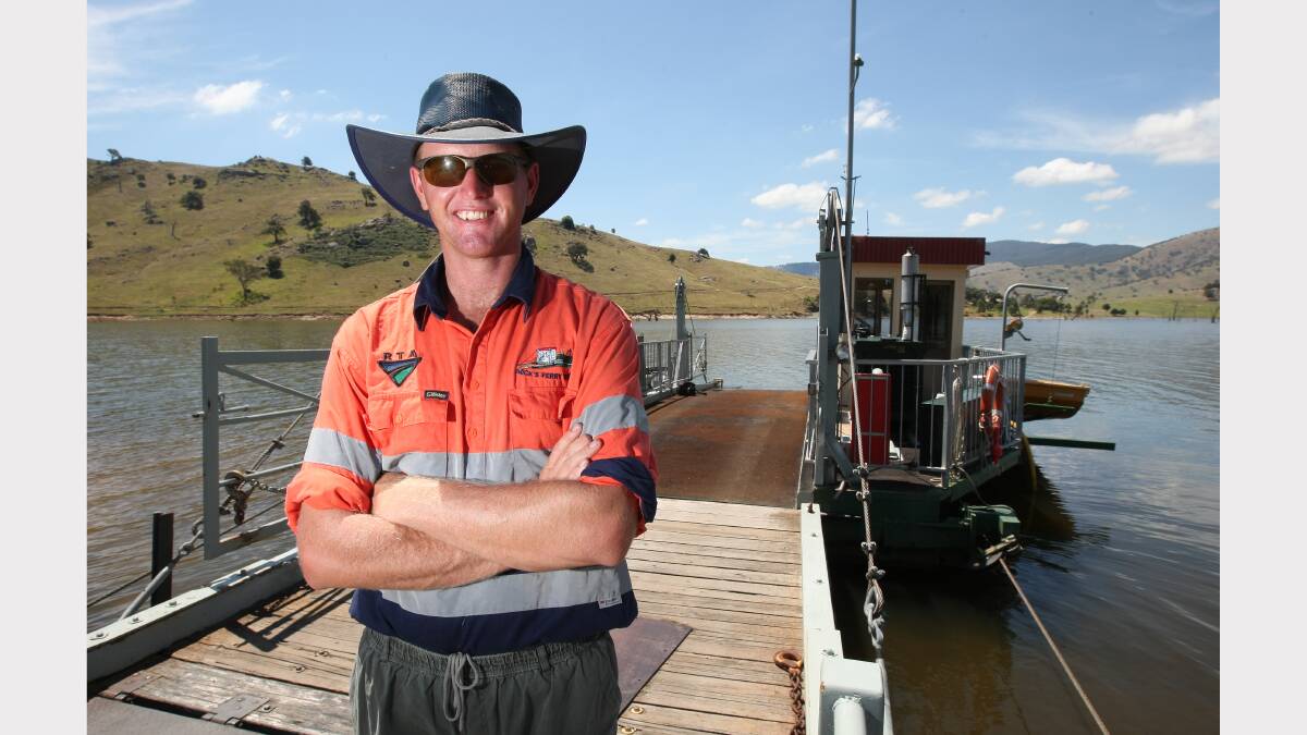 Operator Lyndon Hore with the ferry when higher water levels allowed it to reopen in February, 2011.