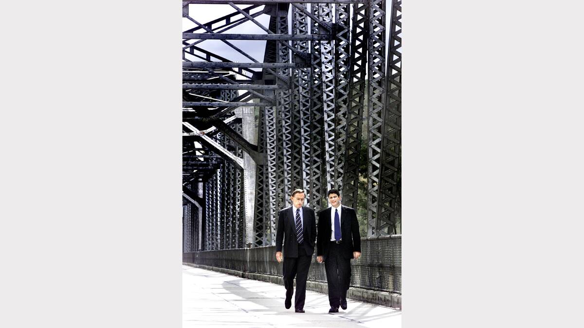 2001 - NSW Premier Bob Carr and Victorian Premier Steve Bracks pictured on the state borders at Bethanga Bridge.