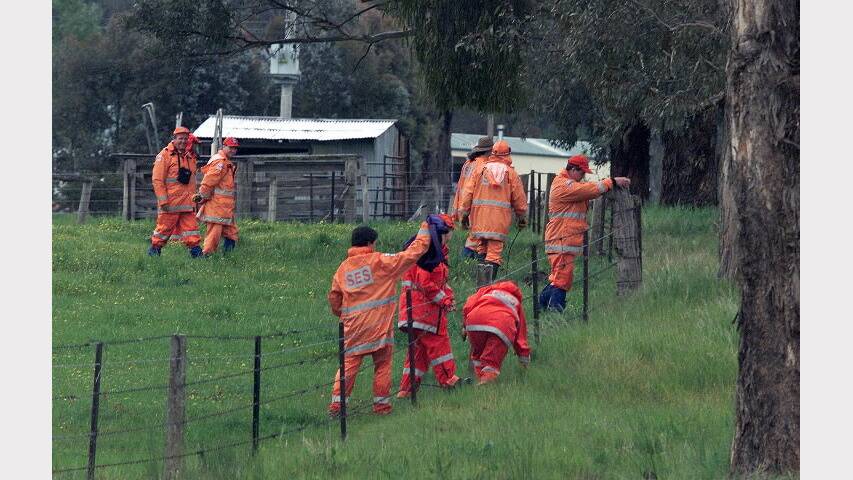 2003 - SES workers search for Daniel Thomas. 