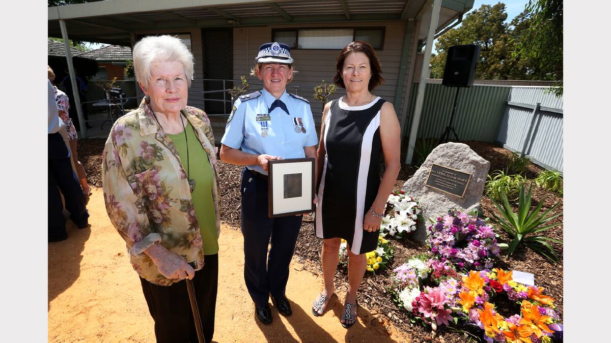 Kyneton's Ben Hunter, Louise Hunter and her daughter Jaymie Watts, of Albury, and Wodonga's Trudy Gibson at the memorial of Sgt Cyril Howe