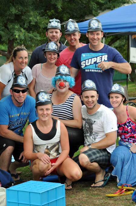 Albury Police Station staff get into the spirit as they prepare for their race in last night’s Big Splash. Picture: JUSTINE ROFE