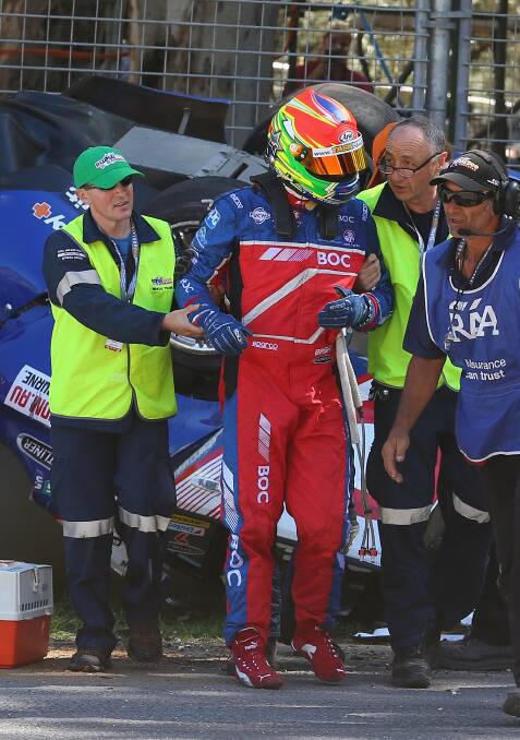 V8 supercar driver Jason Bright was lucky to escape after his car rolled during race three  of the V8 Supercars Championship Series at the Adelaide Street Circuit. Pictures: GETTY IMAGES