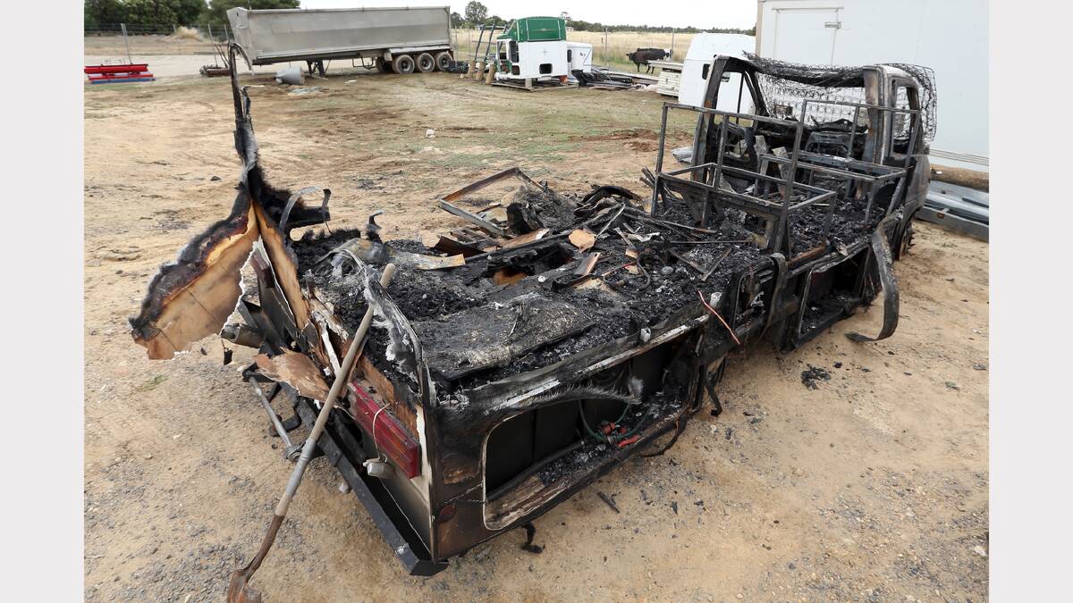 The remains of a burnt-out Winnebago campervan.