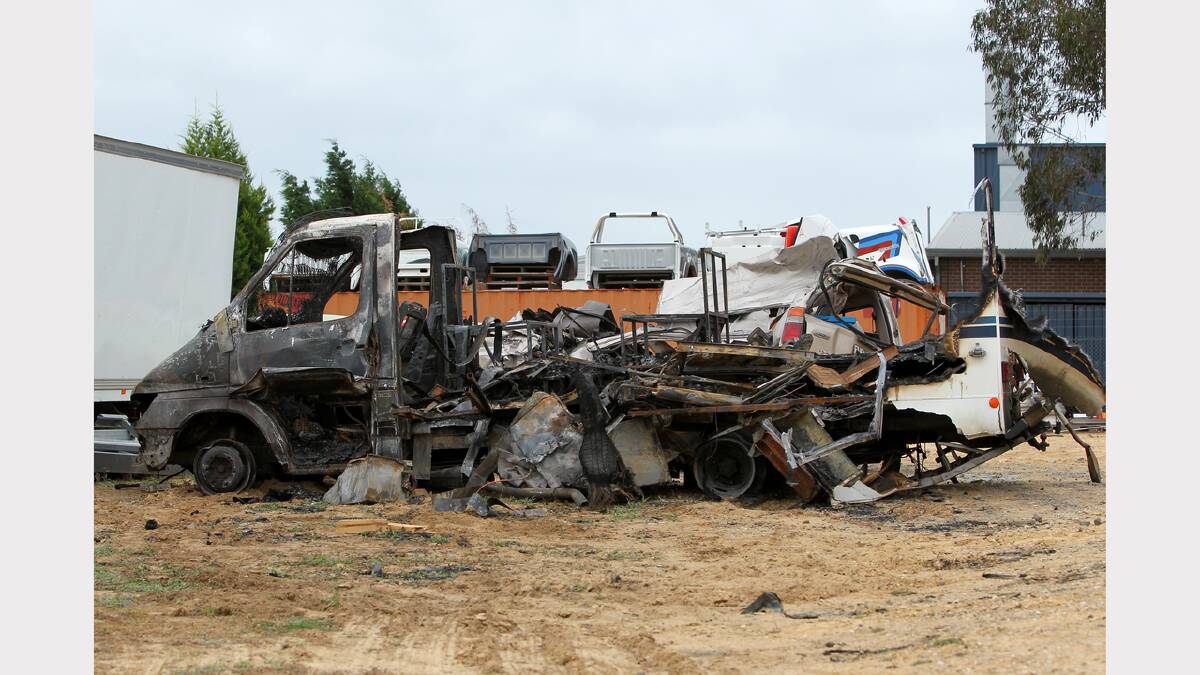 The remains of a burnt-out Winnebago campervan.