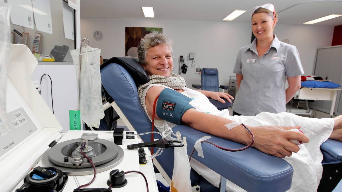 Albury teacher Olwen Steel, with nurse Tanya Cannizzaro, makes her 300th blood donation yesterday. Picture: DAVID THORPE