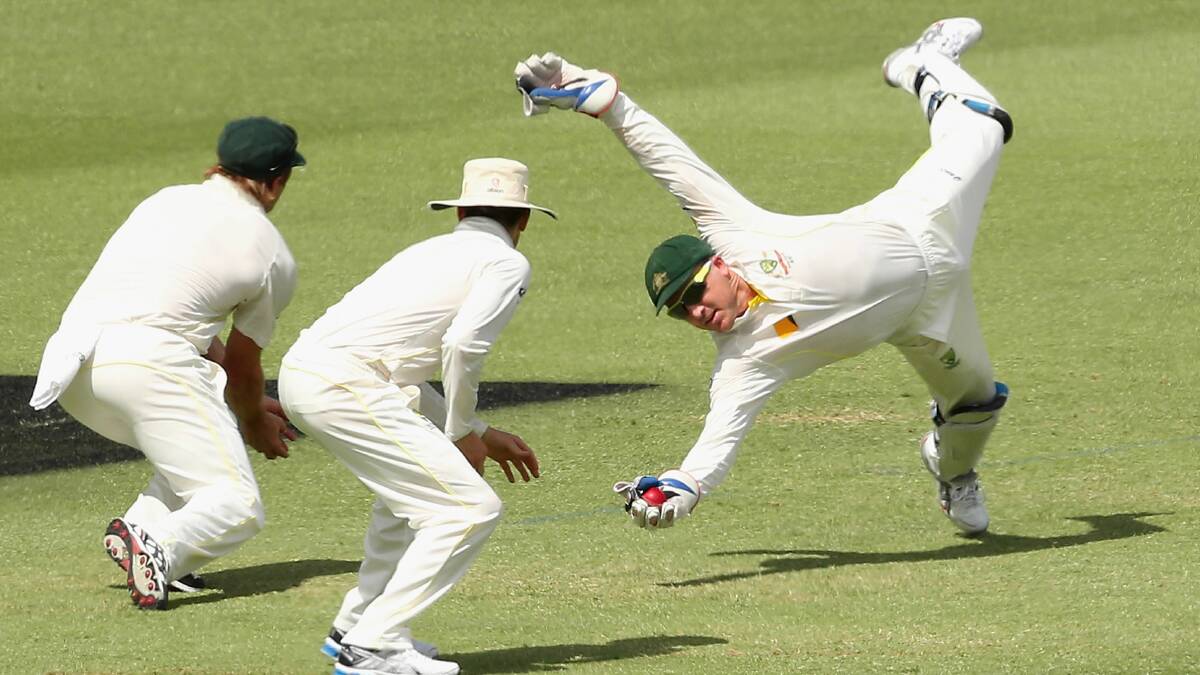 What a catch! Brad Haddin of Australia takes a catch to dismiss Joe Root of England. Picture: GETTY IMAGES
