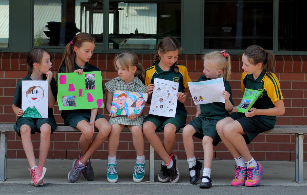 Some of the handwritten messages of love for Emily and Brooke from their schoolmates. Picture: DAVID THORPE