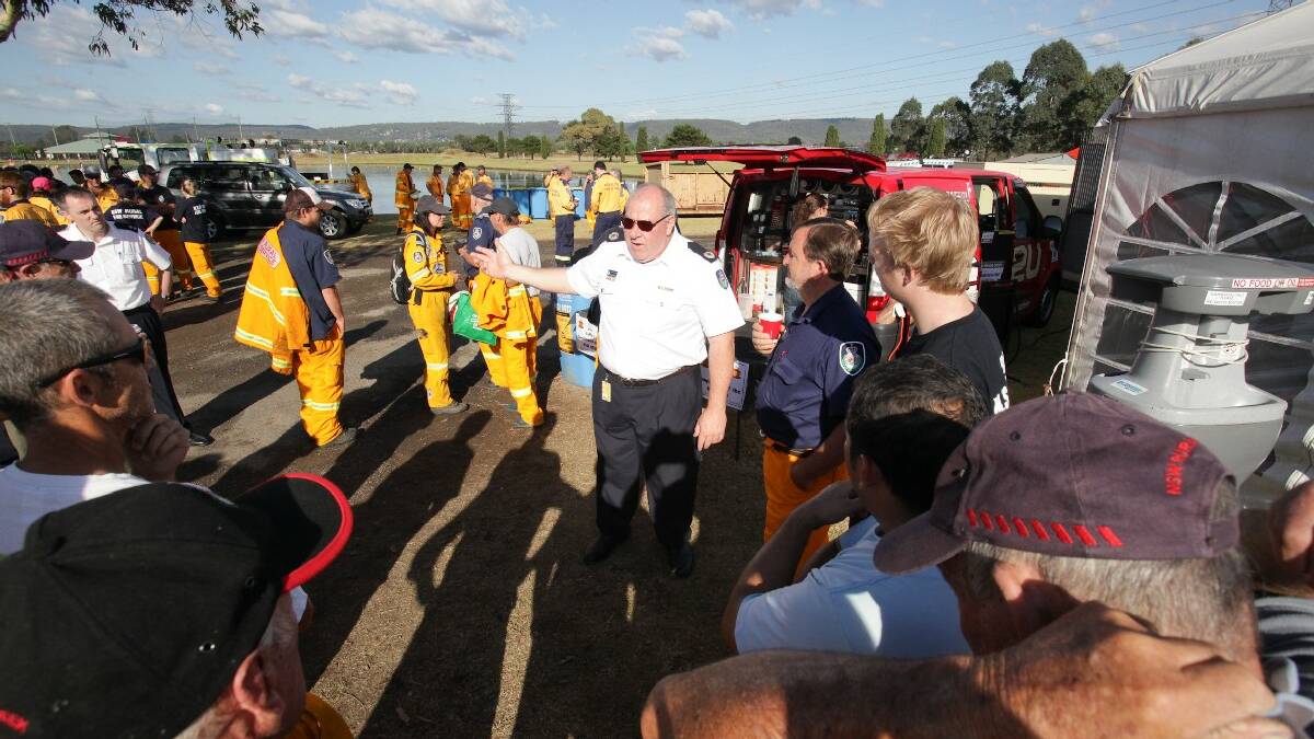 RFS Assistant Commissioner Bruce McDonald arrives to brief RFS members at the RFS Base, Penrith Panthers. Picture: Geoff Jones