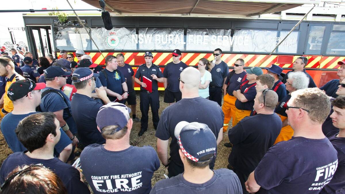 RFS Assistant Commissioner Bruce McDonald briefs RFS members at the RFS Base, Penrith Panthers. Picture: Geoff Jones