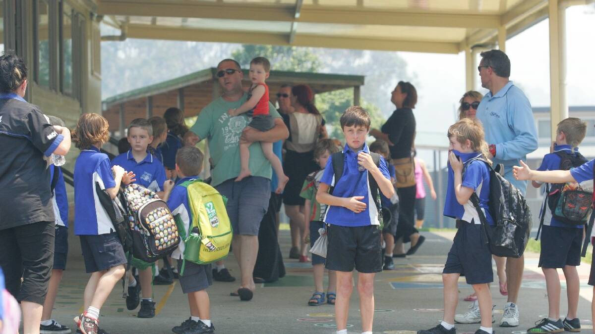 Children leaving Minmi Public School. Picture: Dean Osland
