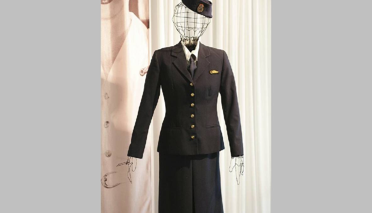 The winter uniform of 1948 comprised of a navy skirt, jacket and tie with a white blouse, navy shoes, seamed stockings, a navy bag, navy coat and navy forage cap along with numerous Qantas Empire Airways buttons and shanks to complete the outfit. Photo: Fiona Morris
