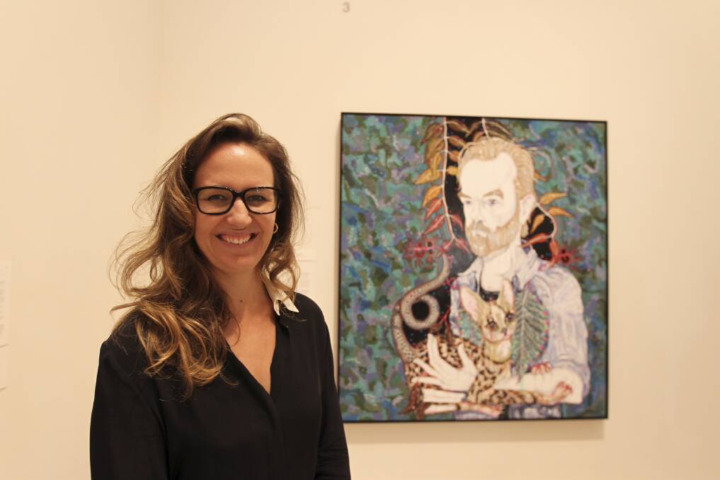 Winner of the 2013 Archibald Prize, Del Kathryn Barton with her portrait of 'Hugo'. Photo: Tamara Dean
