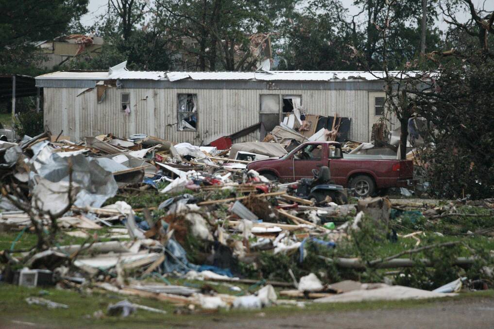 Debris is seen at a mobile home park which was destroyed by a tornado. Photo: REUTERS