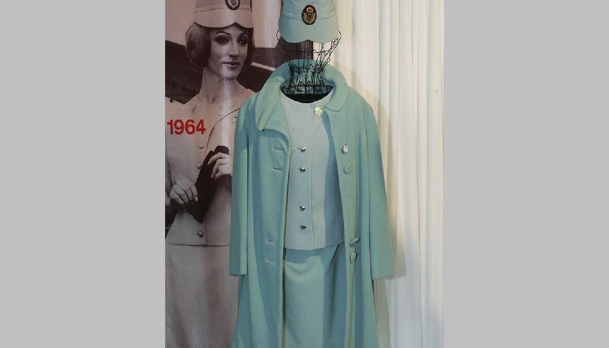 The 1964-69 uniform changed to an aqua fitted dress that was fully lined, thus eliminating the need for a petticoat.