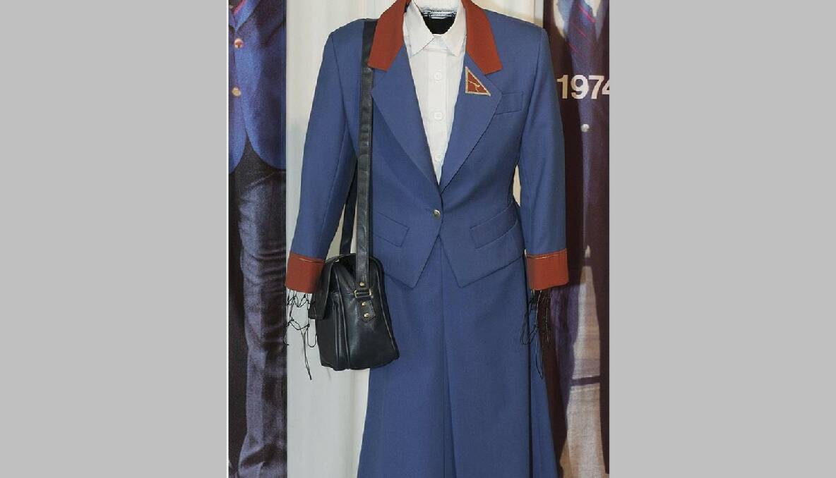 Variations of the 1985 uniform featured a blue skirt and a short blue jacket which had contrasting collar and cuffs in terracotta.