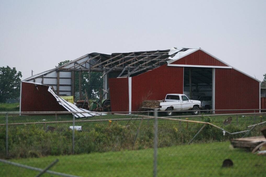 A barn's roof and siding is torn off after a tornado swept through west of Shawnee, Oklahoma. Photo: REUTERS